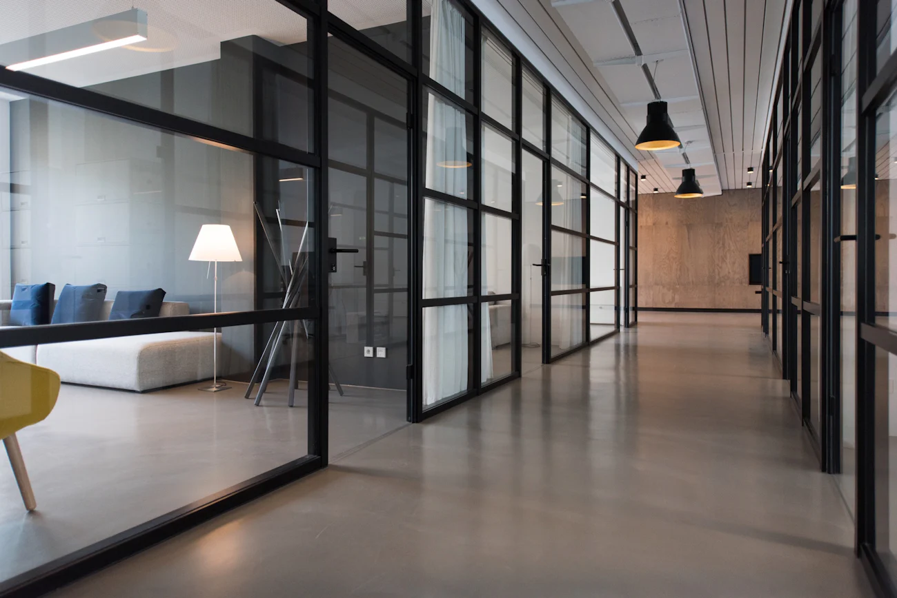 Modern commercial interior with ceiling and pendant lighting